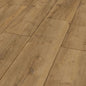 Advanced Plus Welsh Oak Brown 4618 -laminaatin keskiruskea puukuosi, luonnolliset oksakuviot ja useampi leveä lankku lähikuvassa.